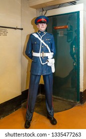 London, United Kingdom - October 3 2013: An Armed Guard In Front Of The Door To The Cabinet War Room, Part Of The Churchill War Rooms Museum
