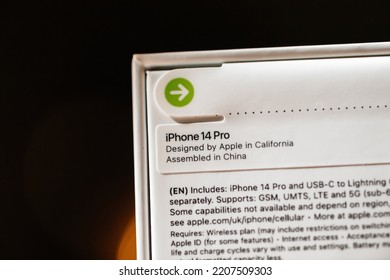 London, United Kingdom - Sep 26, 2022: Environmentally Friendly Packaging Of Latest IPhone 14 Pro Professional By Apple Computers Paper Security Seal Instead Of Plastic Unboxing