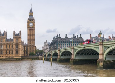 LONDON, UNITED KINGDOM-18 OCT 2016: Big Ben And Houses Of Parliament During Cloudy Day Taken From Busy Westminster Bridge Beside The River Thames.