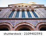 London Westminster Abbey Chapel large church facade exterior sign with brick architecture low angle view looking up at sky with windows tower and nobody