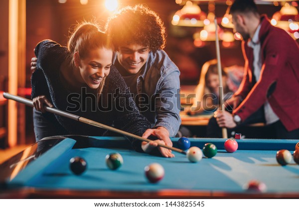 London/England -
08/12/2018  men playing
pool
