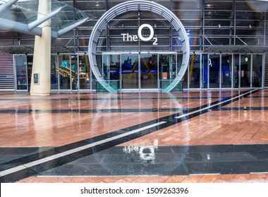 London,North Greenwich,United Kingdom -July/27/2019  :The O2 Arena In London Main Entrance In A rainy Day with nice water reflection