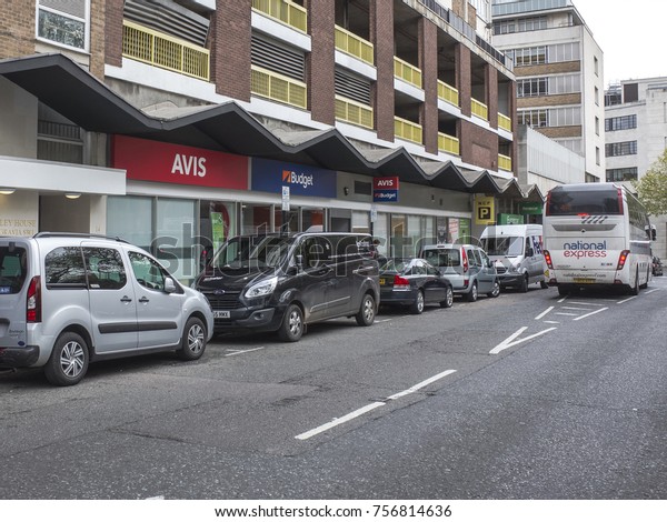 LONDON-NOVEMBER, 2017: Car hire\
depots Avis and Budget at the rear of Victoria Coach Station in\
central London