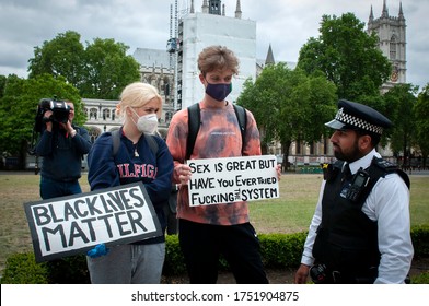 London/UK -06/08/202: Editorial Illustration, A Couple Of Black Lives Matter Demonstrators In Quiet Conversation With A Police Officer At Parliament Square