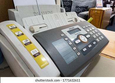 London.UK- 07.07.2020: a fax machine made by Philips in the office of a furniture retailer. 