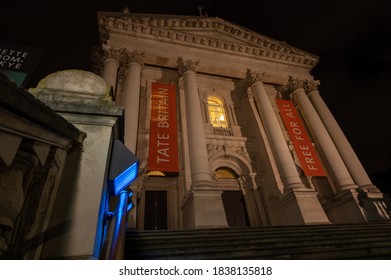 London/UK - 18 Oct 2020: View Looking Up At The Tate Modern Art Gallery Front Entrance At Night