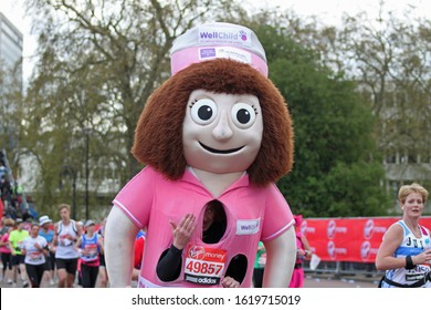 London/UK 4/22/12 Virgin London Marathon 2012. Yards From The Finish By Buckingham Palace Rob Schooling Gets To The End Dressed As The Well Child Nurse Mascot Raising Funds For The Charity