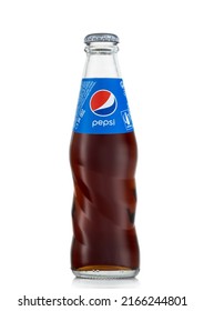 LONDON,UK - APRIL 12, 2022: Glass bottle of Pepsi cola original taste on white.