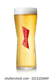 LONDON,UK - AUGUST 11,2022: Budweiser Beer In Original Glass With Foam On White.