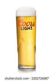 LONDON,UK - AUGUST 20,2022: Coors Light Lager Beer In Original Glass On White.