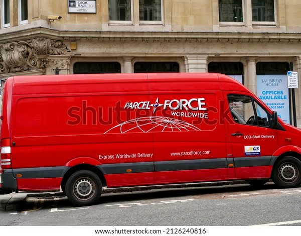 London,UK- February 17,2022: Delivery van from\
the Parcel Force service parking on a downtown street in London.\
Parcelforce Worldwide is a courier and logistics service in the\
United Kingdom.