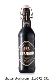 LONDON,UK - MAY 01, 2022: Bottle Of Bernard Dark Lager Beer On White. Craft Czech Brewery.