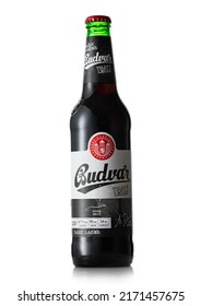 LONDON,UK - MAY 11, 2022: Budvar Dark Lager Beer In Glass Bottle On White Background.