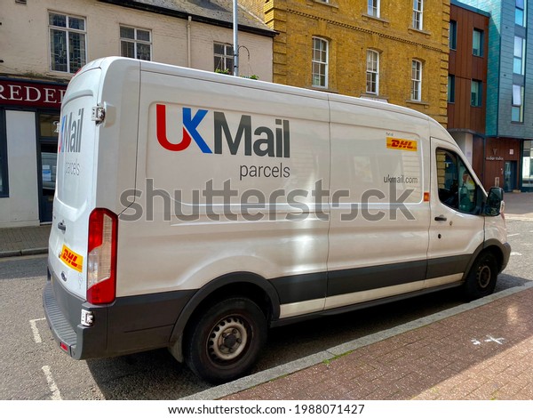 London,UK- May 28,\
2021: A UK Mail delivery lorry parked at the side of the street. UK\
Mail is part of the Deutsche Post DHL Group, the world\'s leading\
mail and logistics company.\
