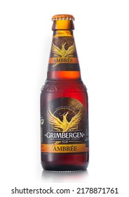 LONDON,UK - MAY 29, 2022: Bottle Of Grimbergen Amber Ambree Lager Craft Beer On White.