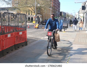                                London.UK.April 11th 2020. More cyclists found to be flouting law on riding on pavements during coronavirus lockdown even though roads are empty.