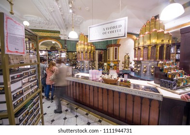 LONDON,UK-AUGUST 26,2011: Men Serve Customers In The Harrods  Food Zone. At Harrods Commercial Center.With Over One Million Square Feet Of Selling Space In Over 330 Departments, Harrods Is The Biggest