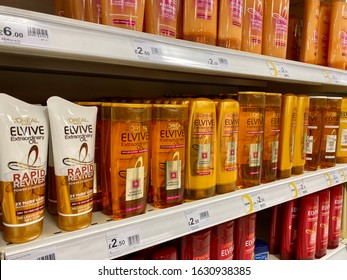 London,UK/January 14,2020: Kinds Of L'oreal Shampoo And Conditioner Displayed On The Shelves Of A Pharmacy Store.