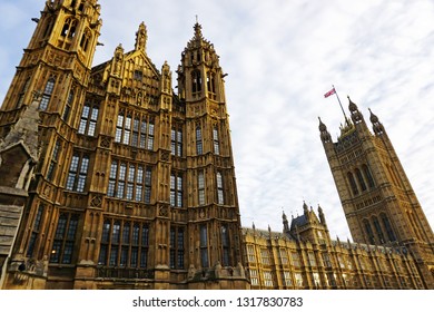 LONDON,UNITED KINGDOM-FEBRUARY 5,2019:Exterior building architecture and design of 'Elizabeth big ben tower',Great clock Bell at the north end of Westminster Palace in neo-Gothic style with cloudy sky