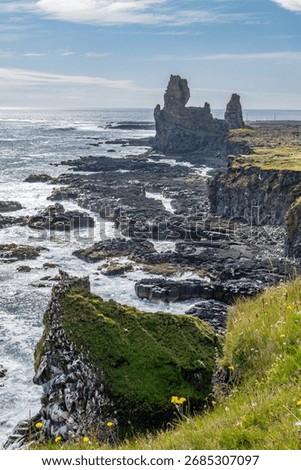 Londrangar Basalt Cliffs in atlantic ocean in Iceland