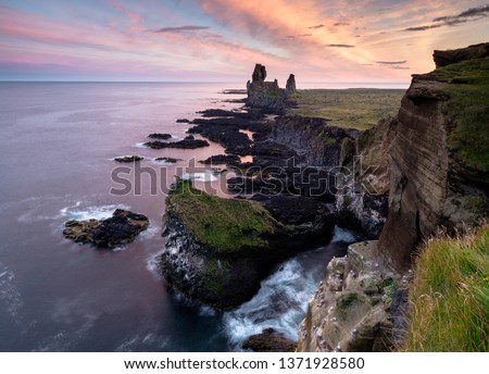 Londrangar cliffs in colorful sunset at snaefellsnes peninsula in Iceland