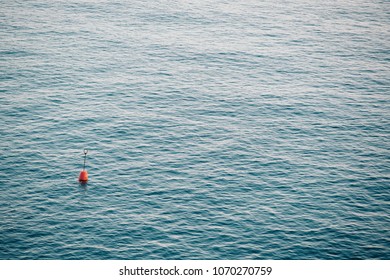 Lone Buoy In The Ocean