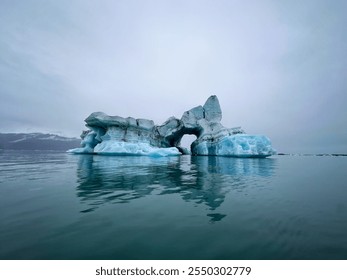 A Lone Iceberg in an Icelandic Glacial Lagoon - Powered by Shutterstock