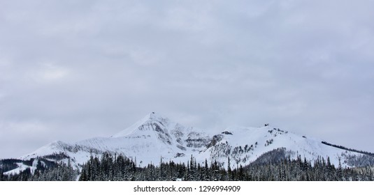 Lone Mountain Against Cloudy Sky At Big Sky Ski Resort, Montana