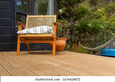 Lone Patio Chair On A Deck