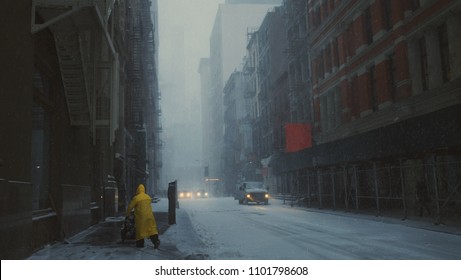 Lone Person Walking Down Snowy Street In New York City