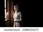 Lone retro rural veil cloth jew slave maid life sad poor lady face look cry plead bible Jesus. Holy cold kid child think ask beg old biblical god Christ wait even flame light war home room text space