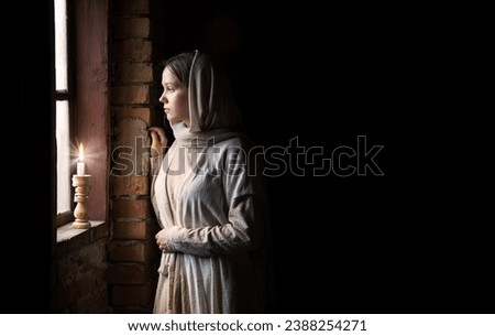 Similar – Image, Stock Photo Lonely veiled  girl in the barren Arabian desert at Sunset