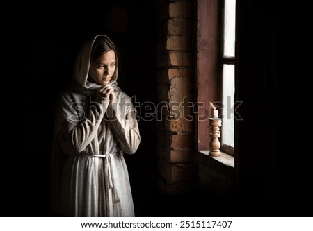 Similar – Image, Stock Photo Lonely veiled  girl in the barren Arabian desert at Sunset
