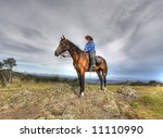 lone rider on a mountain