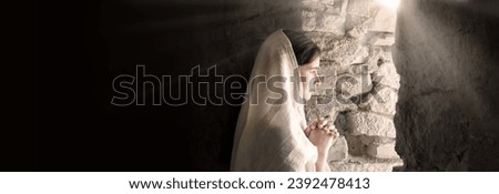 Lone sad worry Jewish human child kid face think ask holy Lord light faith hope love. Young lady stand wait good news empty dark black burial house home room wall feel fear pain grief war text space