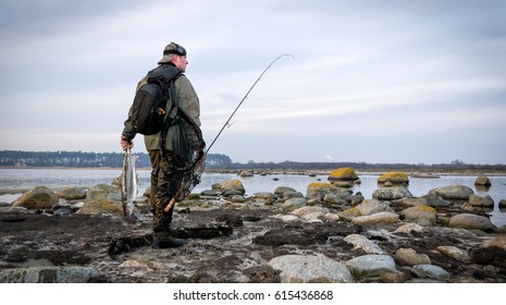 Lonely Angler With Big Sea Trout