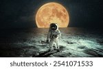 Lonely astronaut walks on the lunar surface. Lunar mission and exploration. Space man on the moon.  Astronaut walks on the ground against the backdrop of a huge yellow moon