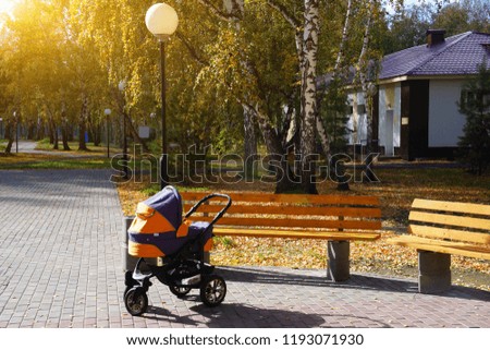 lonely baby carriage near