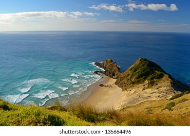 The Lonely Beach Of Cape Reinga (New Zealand - Far North), Where Tasman Sea (left) Meets Pacific Ocean (right). Holy Site For Maori Culture, Where The Spirits Of The Dead Enter The Underworld.