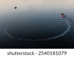 Lonely boat in the Buriganga River 