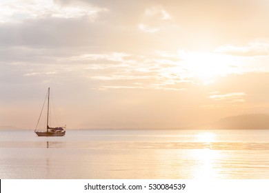 Lonely boat in a calm sea for background