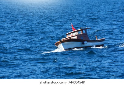 Lonely Boat In A Storm In The Sea