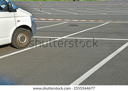 Lonely bus in an empty parking lot