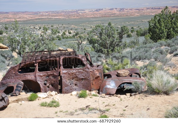 Lonely car used for target practice on Hole in the\
Wall Road in southern\
Utah