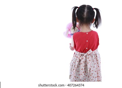 Lonely Child With Doll Sad Gesture. Back View. Isolated On White. 