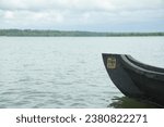 lonely country boat waiting in silent water
