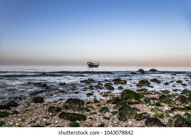 Lonely Dhow (traditional Omani Sailing And Fishing Boat) At The Coast Of Tiwi, Oman