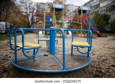 a lonely empty swing on a playground without people - Shutterstock ID 2226236575