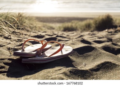 Lonely Flip Flops/ a pair of jandals left on a beach