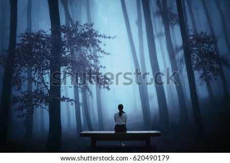 a lonely girl sitting on a bench in a foggy jungle 